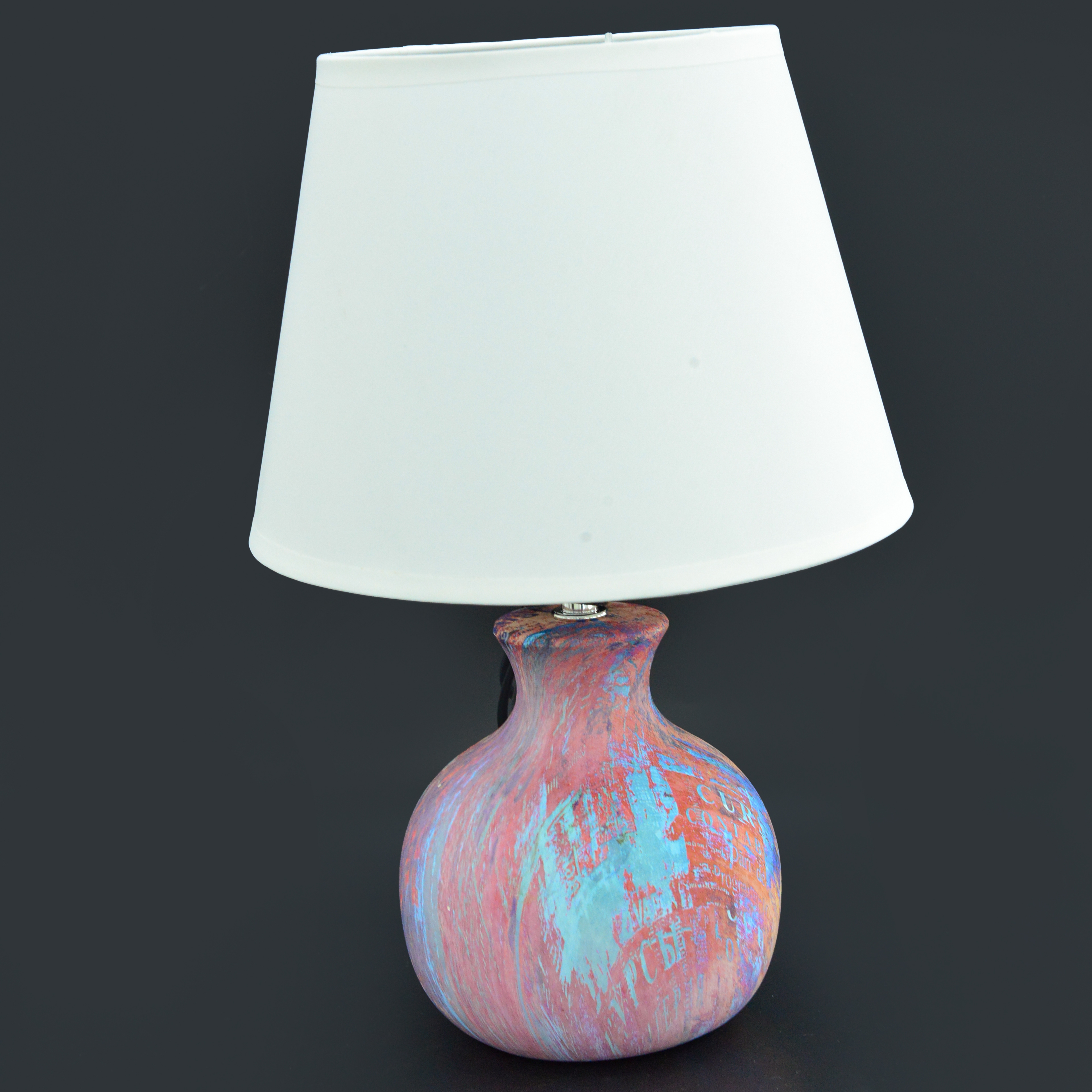 Diary Table Lamp Is a Ceramic Wholesale Table Lamp with Alternating Colors.