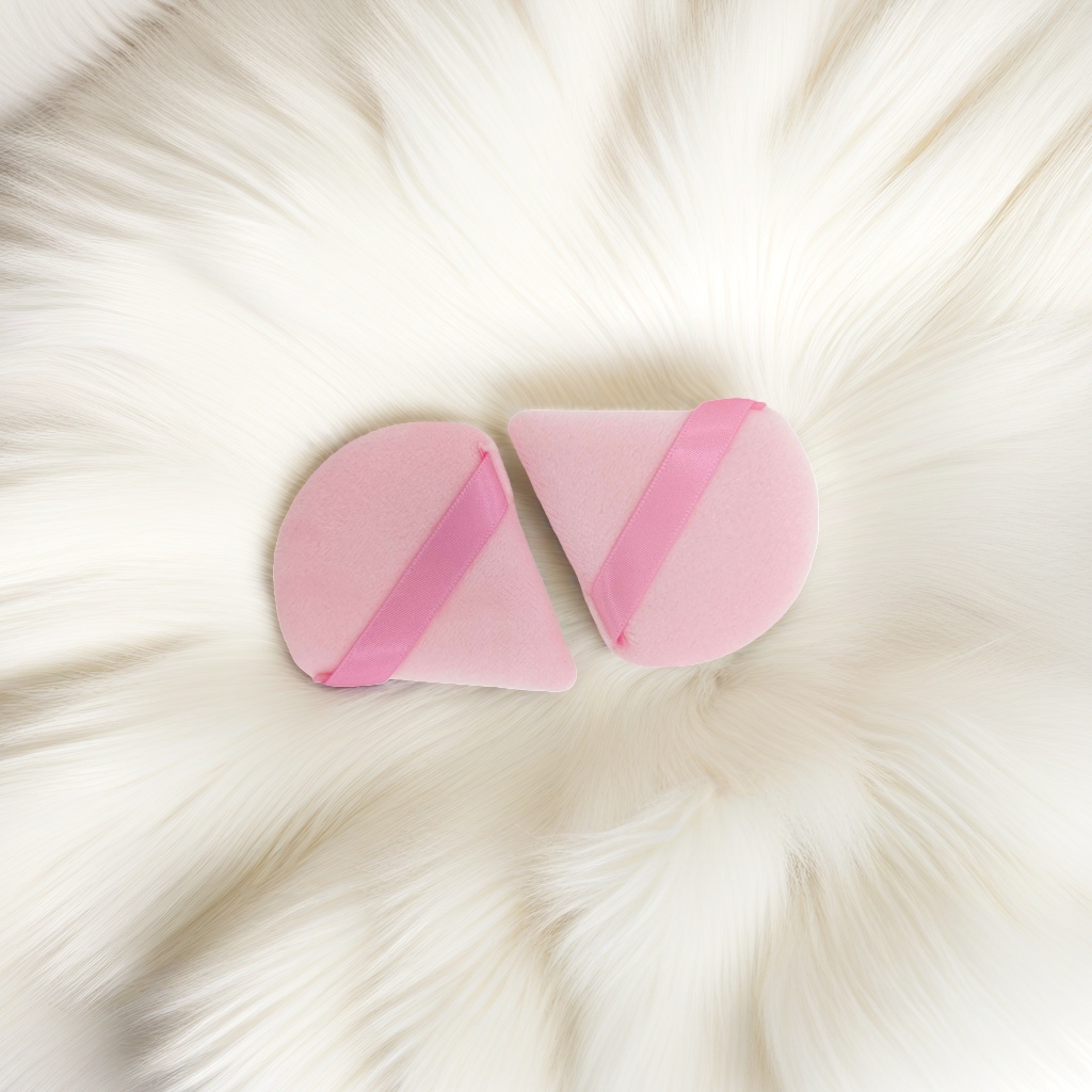 Pink teardrop-shaped makeup sponge, a soft makeup application tool, essential for beauty. 145114049 Application Scenario