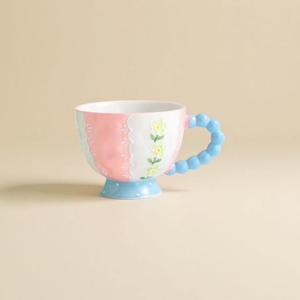 Pink and white ceramic cup, blue bead-shaped handle, flower-patterned ceramic cup, water cup Application Scenario