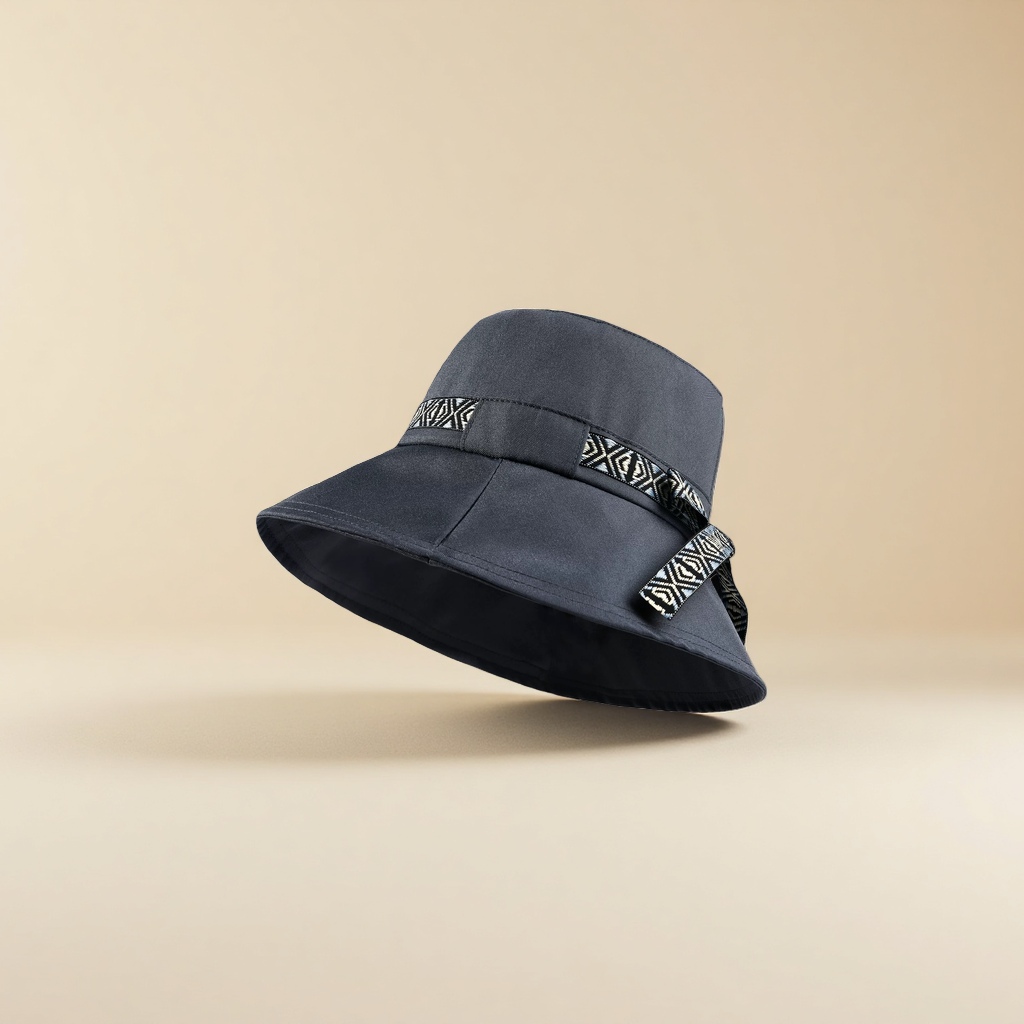 The thin fisherman's hat for spring and summer is fashionable for women. It has a large brim and a small basin hat that shows off the face details Picture
