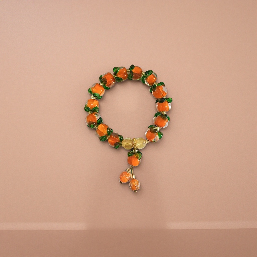 Orange pumpkin-shaped bracelet beads, natural resin handcrafted jewelry details Picture