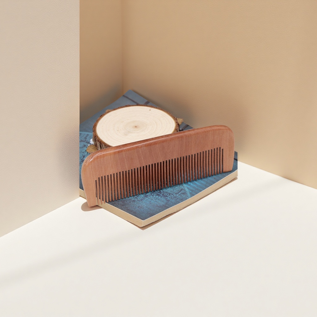The wooden comb is a natural massage comb that provides smooth hair care and prevents tangling