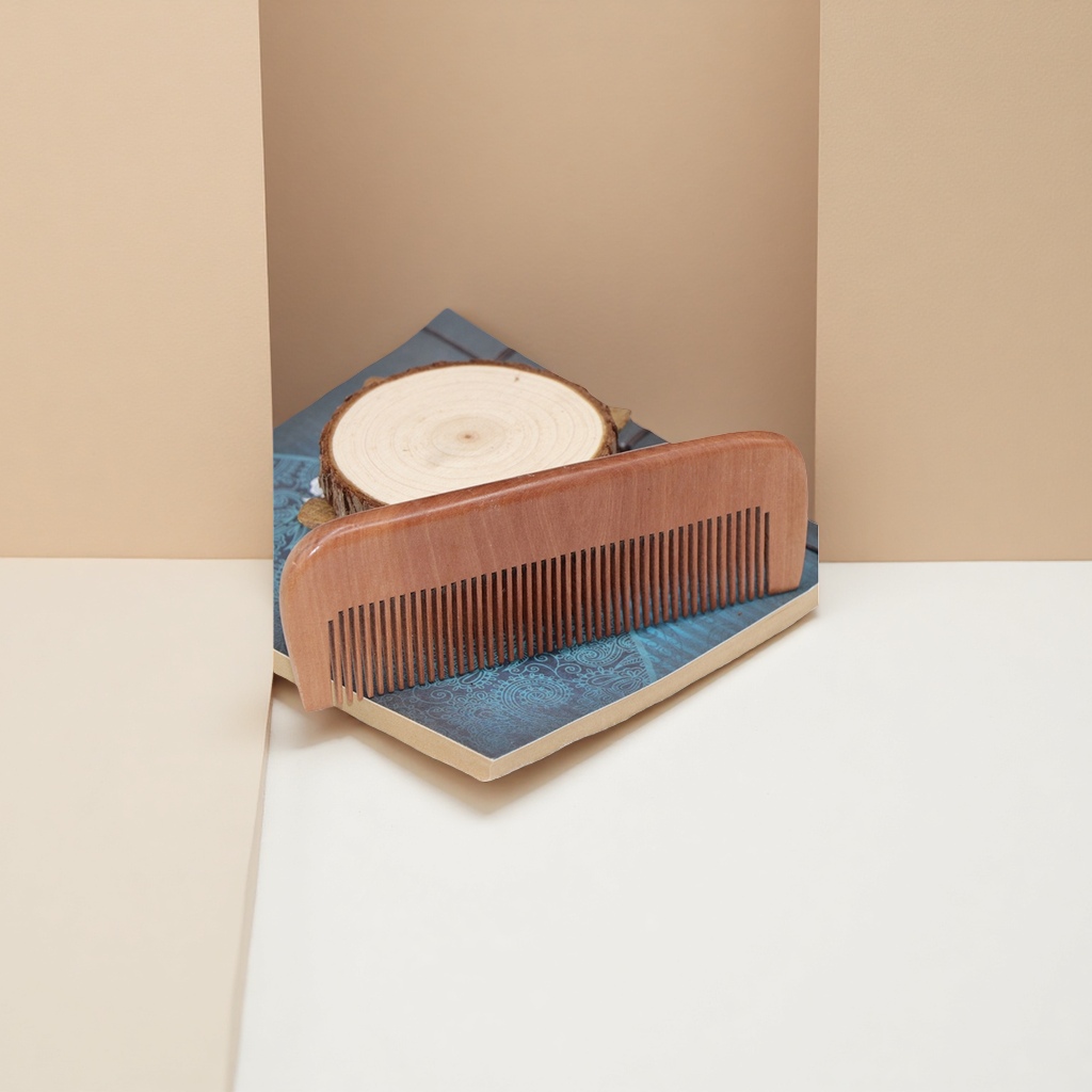 The wooden comb is a natural massage comb that provides smooth hair care and prevents tangling details Picture