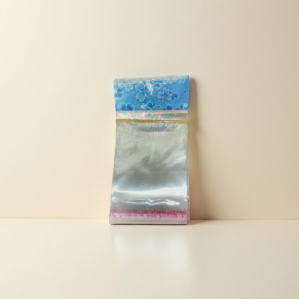 A transparent plastic bag with blue floral patterns details Picture
