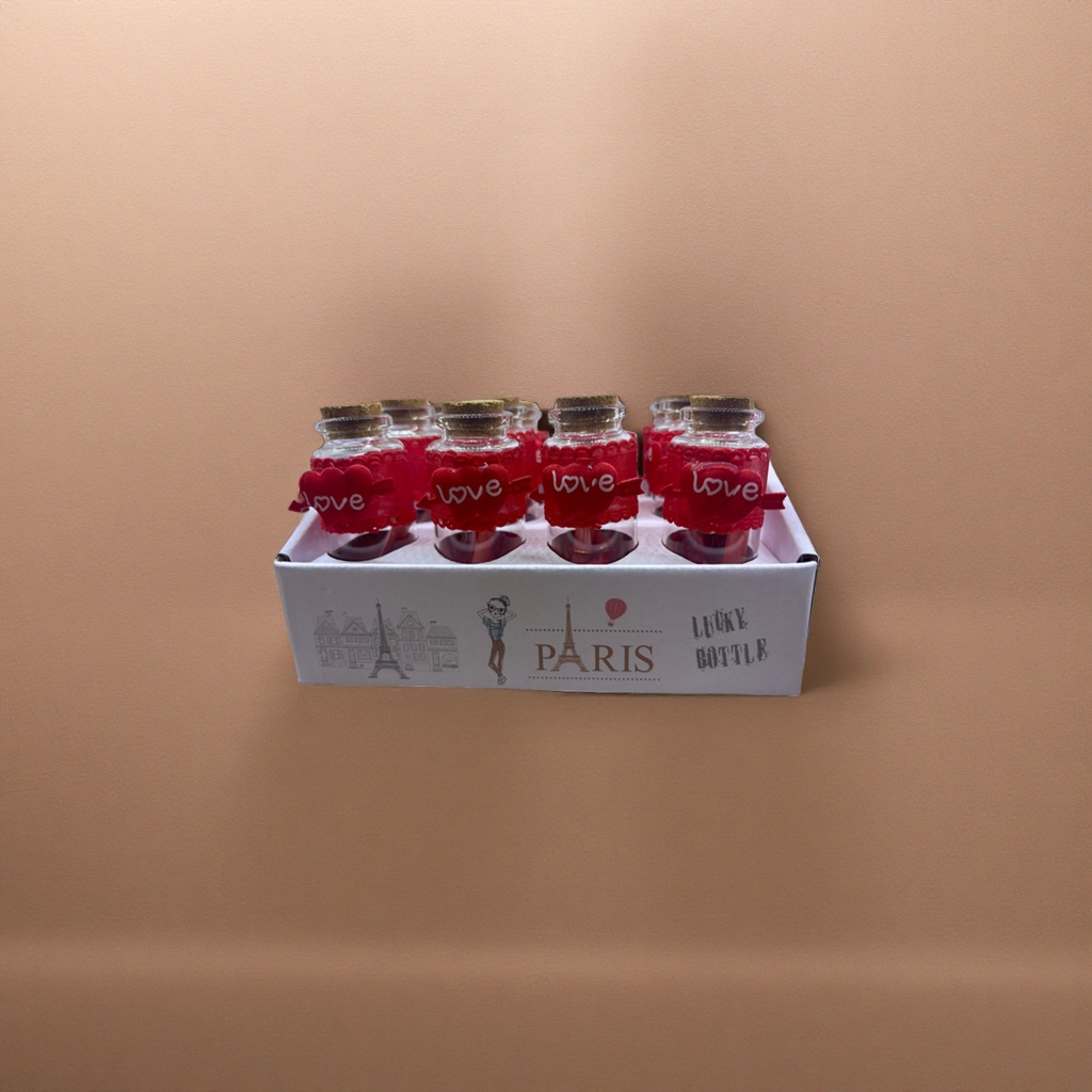 Cute mini perfume bottles with a love theme as couple gifts