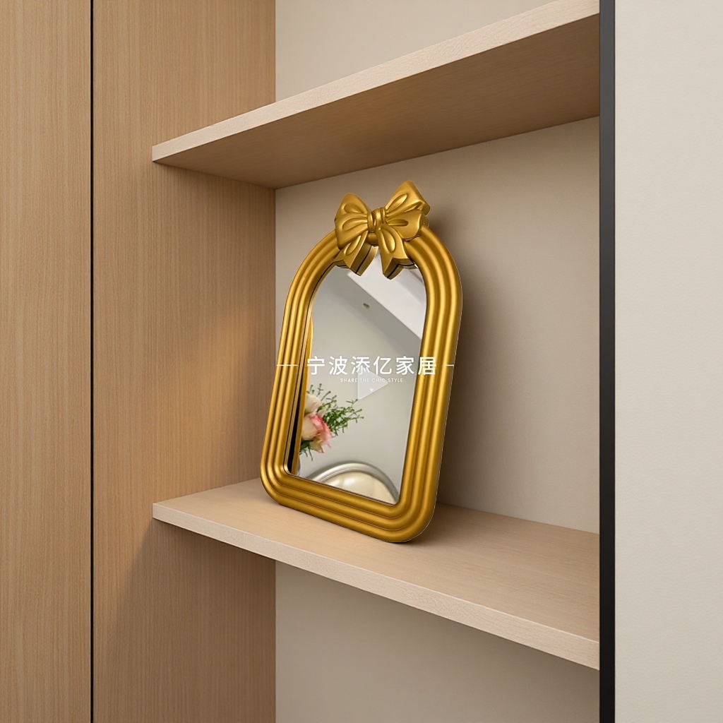 The golden bow decorative mirror frame is a fashionable home decoration with a simple style details Picture