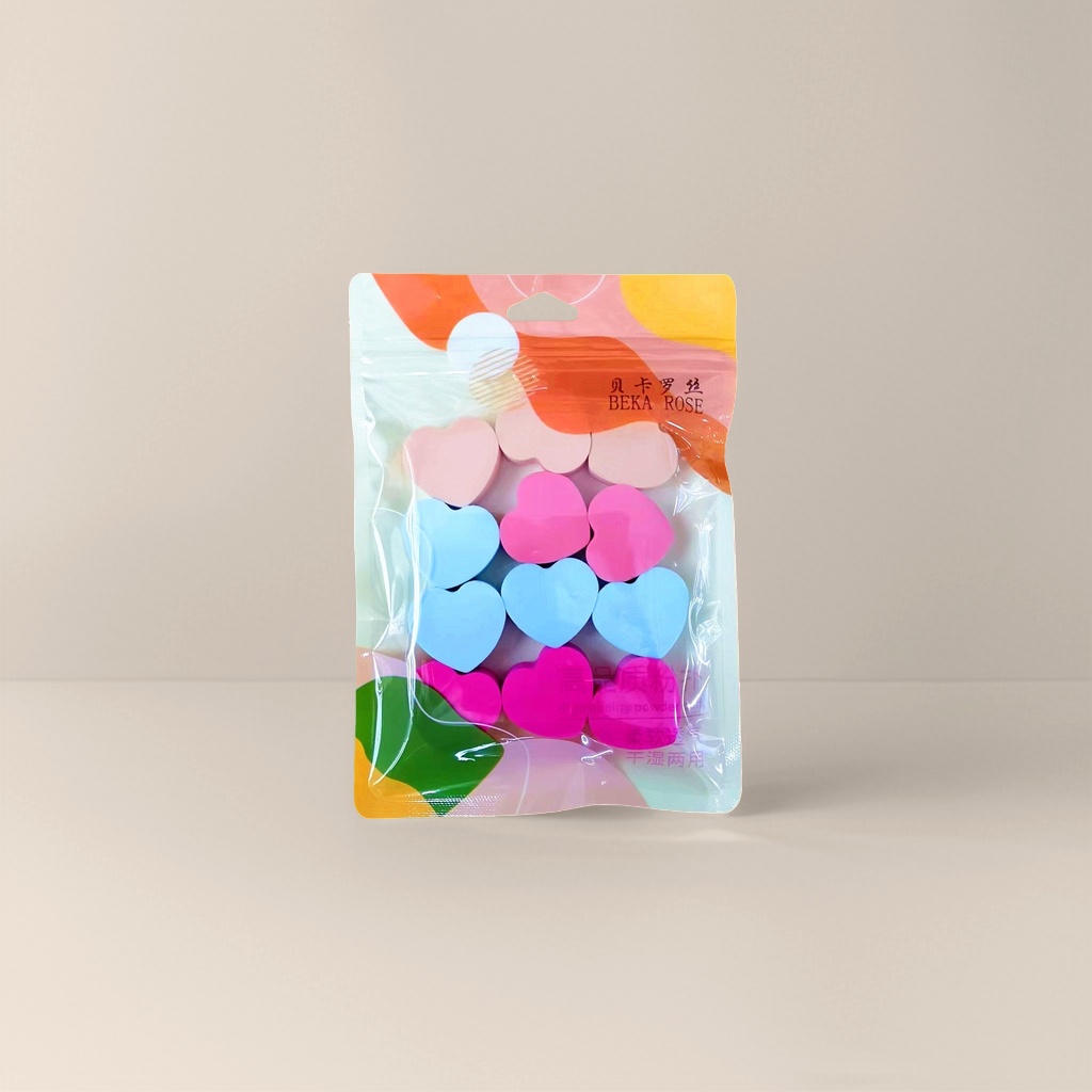 Heart-shaped makeup sponge, a pink and cute beauty tool picture as the main subject