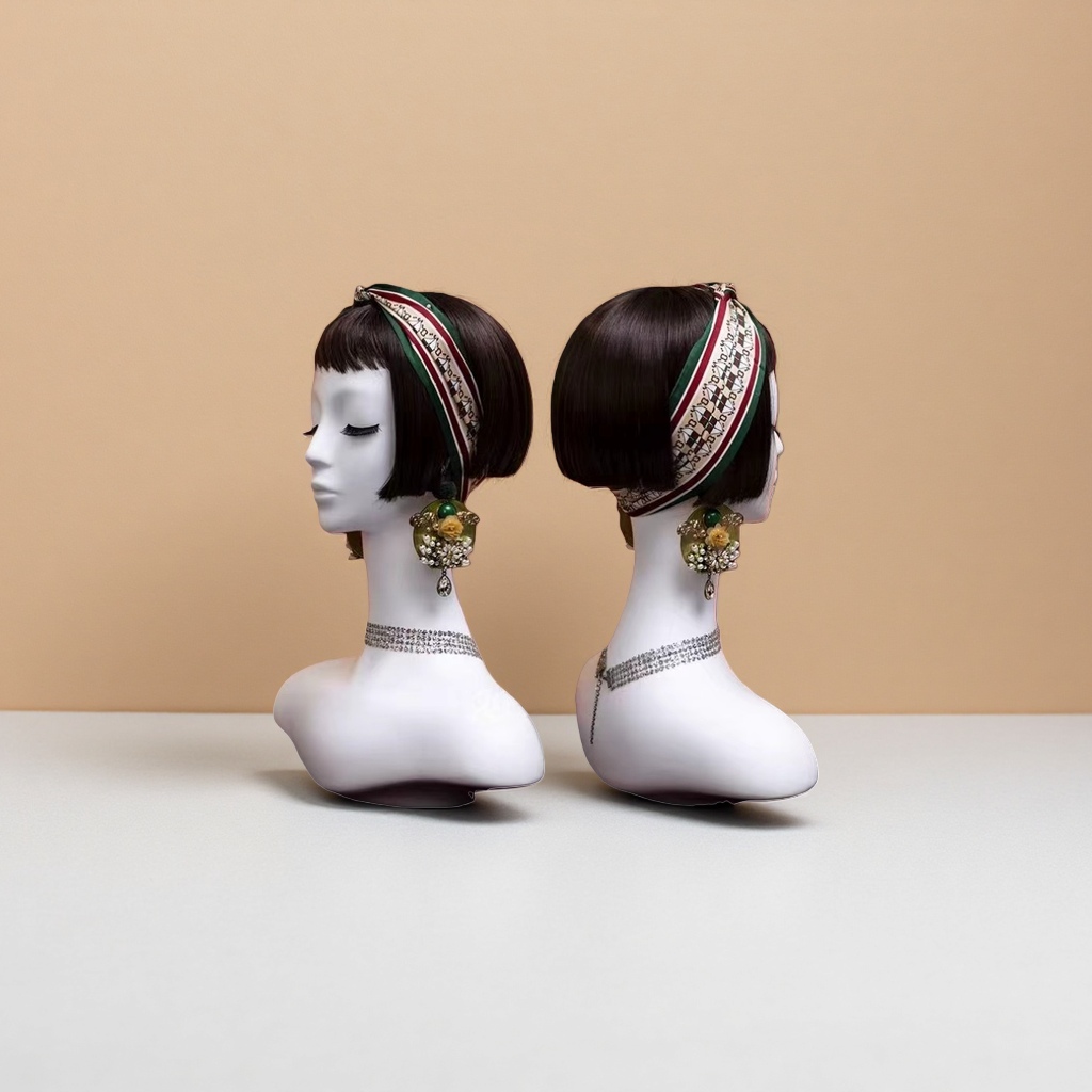 The mannequin shows a wide head