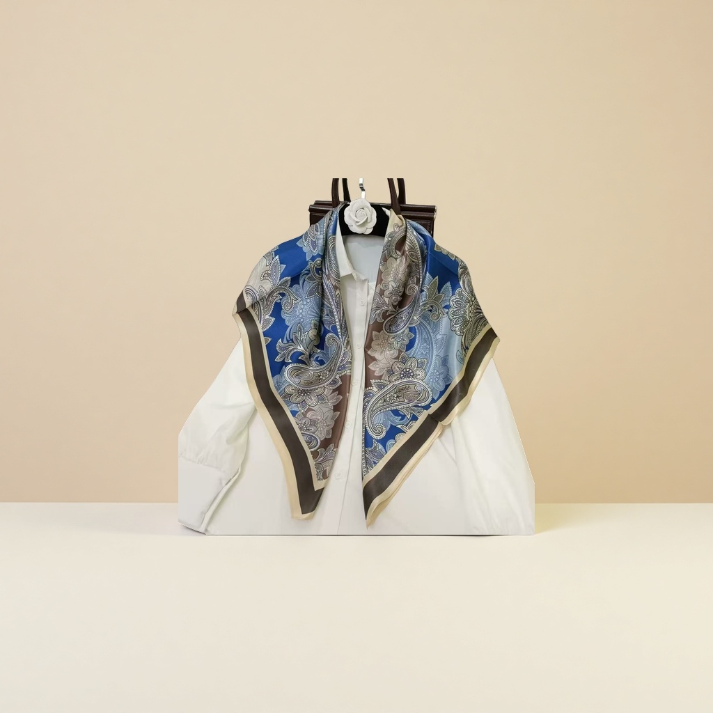 The silk scarf is a fashionable printed silk scarf for women, elegant and versatile for spring and summer