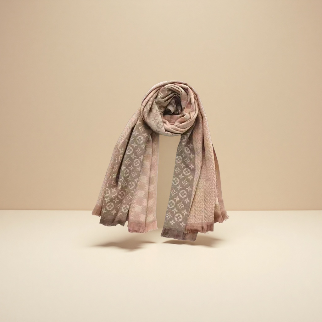 A thick pink knitted scarf for warm women, a fashionable and versatile winter scarf