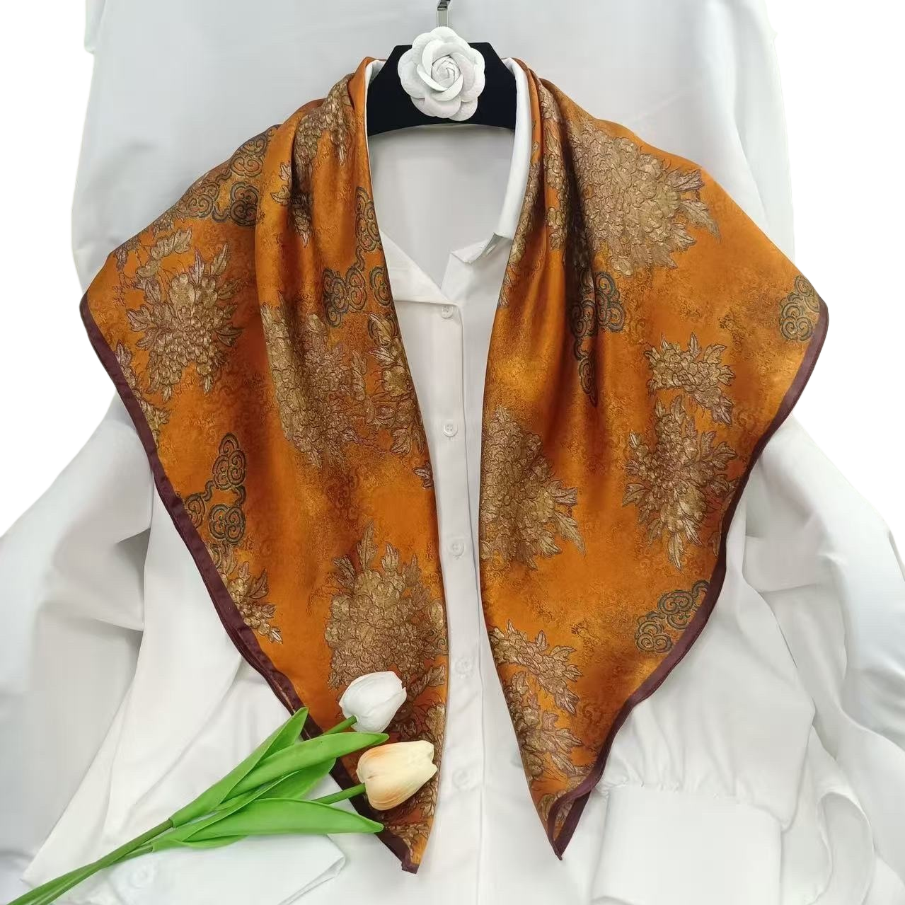 An orange floral pattern silk scarf is a fashionable and elegant silk scarf for women Item Picture
