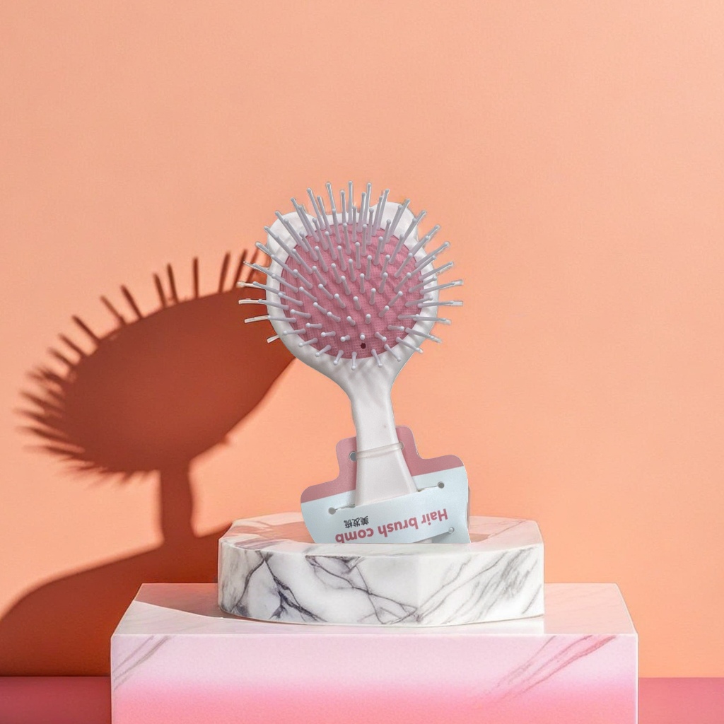 The pink comb is a perfect hair-combing tool. It features an anti-static comb that makes your hair smooth and soft details Picture