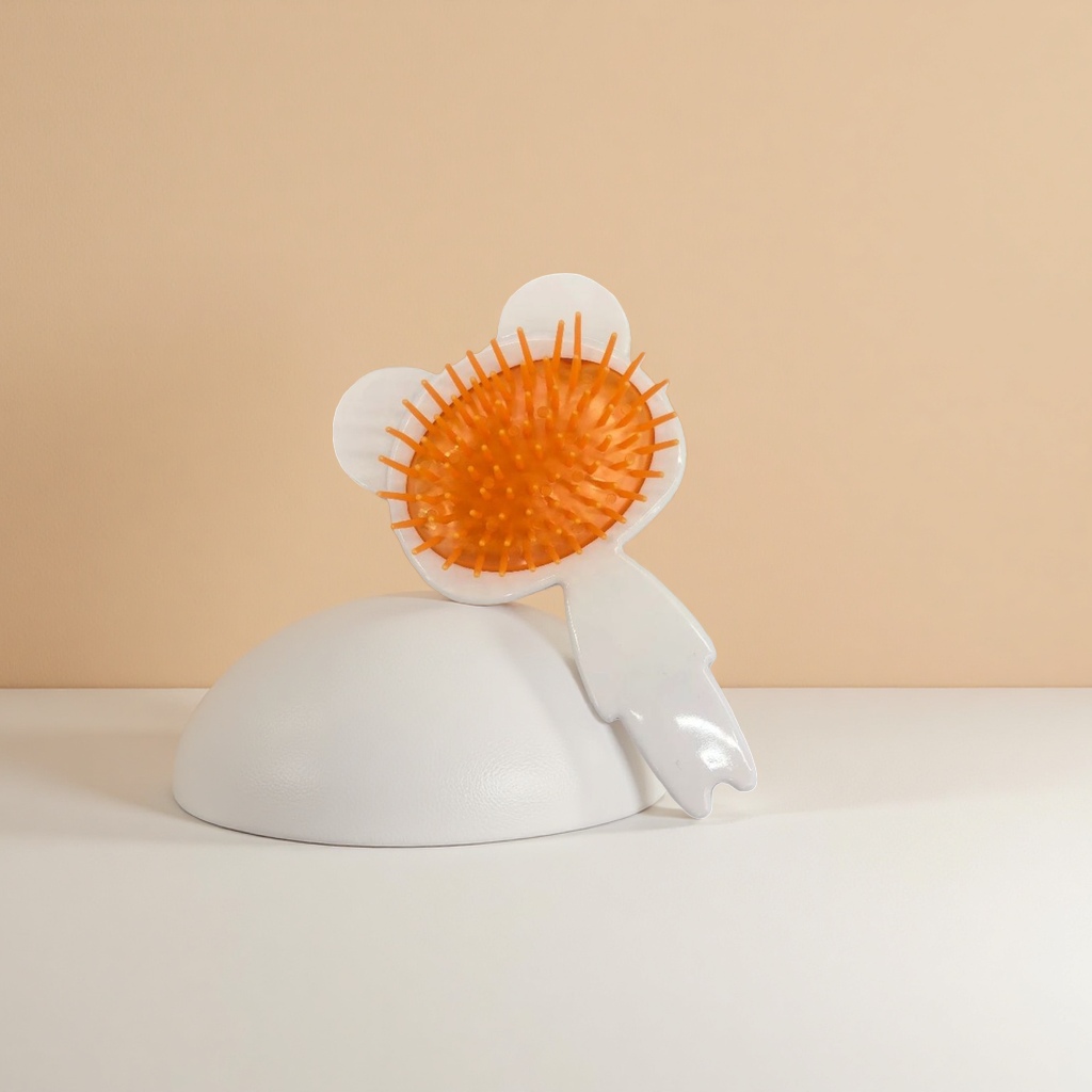 The orange comb teeth and white flower-shaped comb are anti-static and ensure smooth combing Specification image