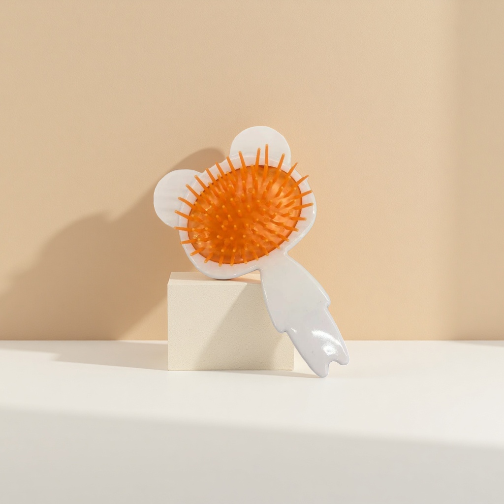 The orange comb teeth and white flower-shaped comb are anti-static and ensure smooth combing details Picture