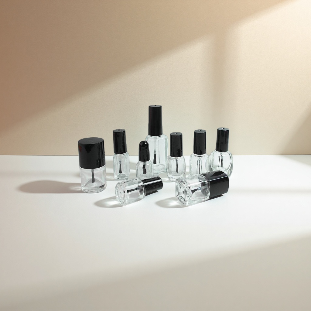 Transparent glass bottle with black cap nail polish bottle