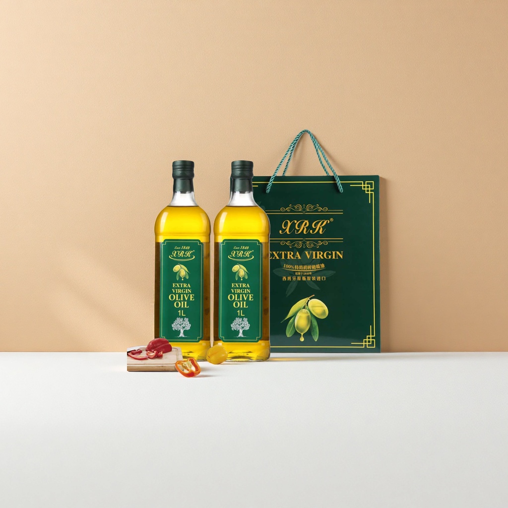 Two bottles of extra virgin olive oil in a gift box packaging
