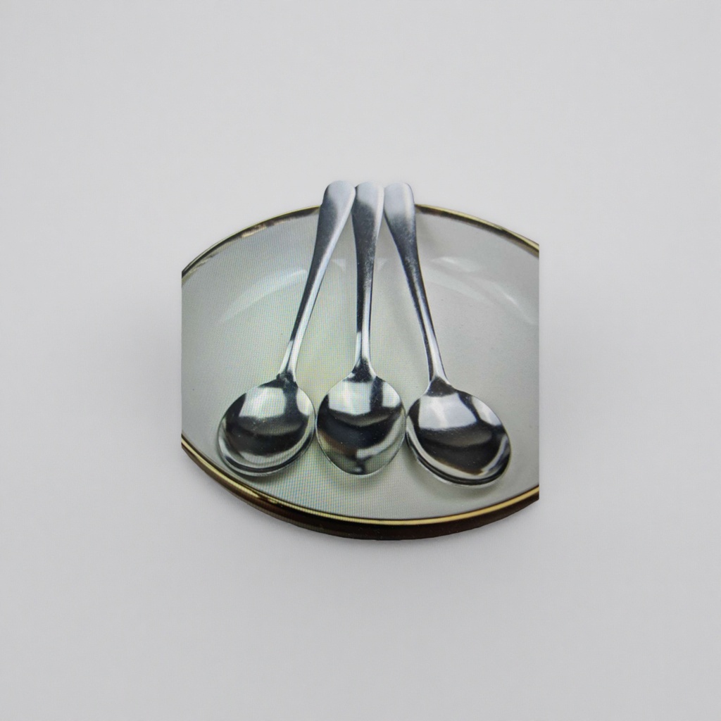 A set of three silver metal spoons with a white gold-edge tray details Picture