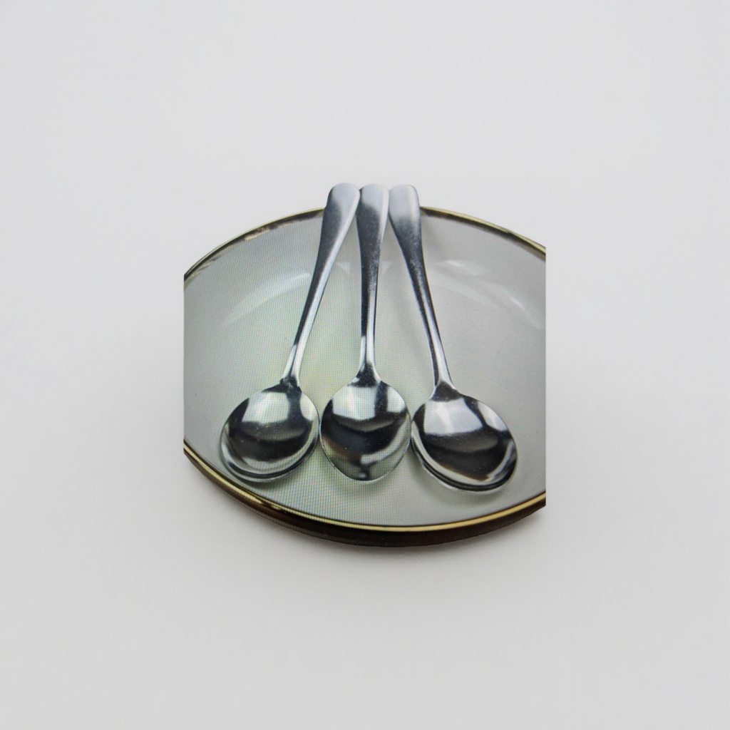 A set of three silver metal spoons with a white gold-edge tray Specification image