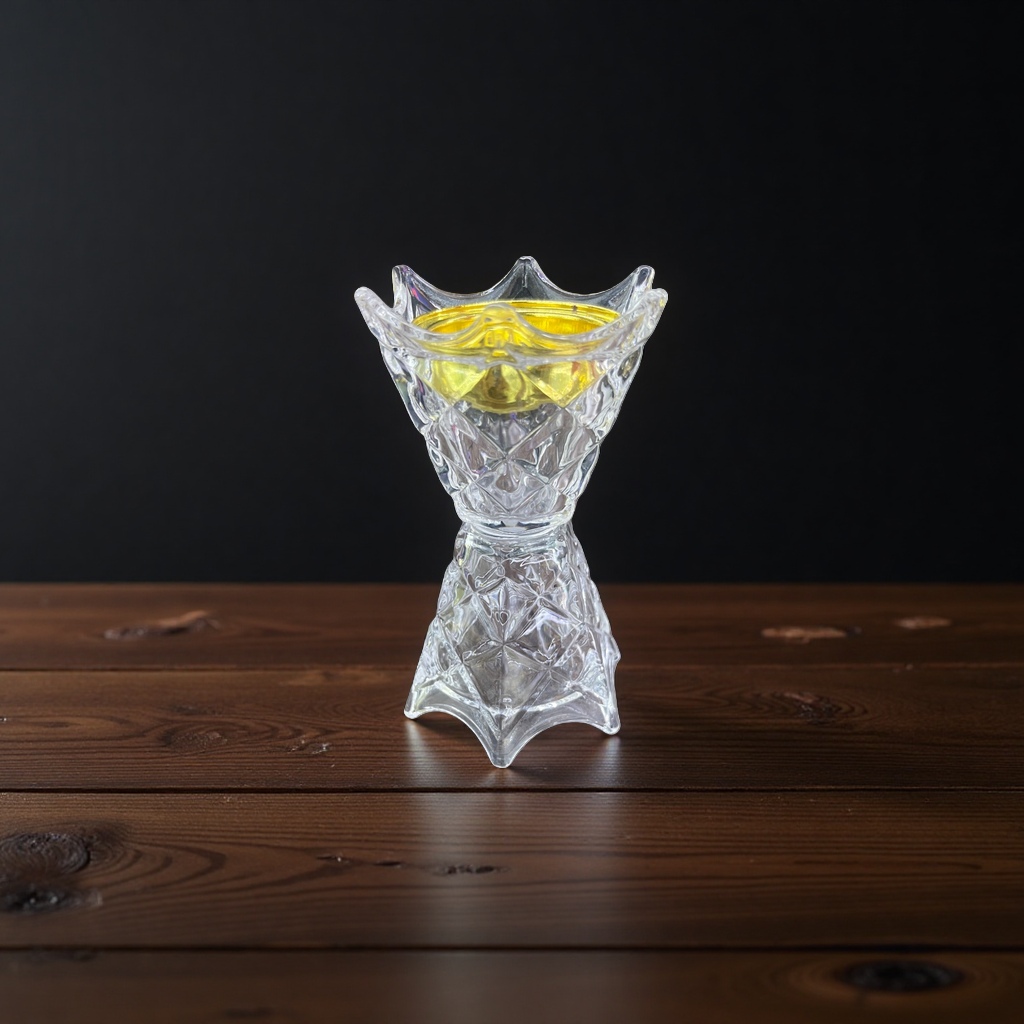 Transparent glass candlestick is a simple and modern home decoration item with a tall candle stand details Picture