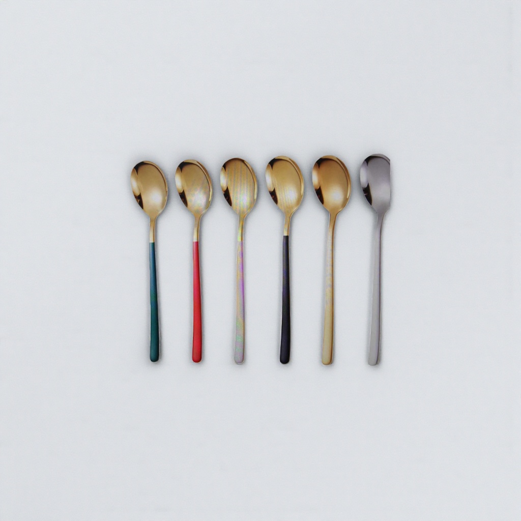 Golden colored handle spoon, stainless steel kitchenware, household dessert spoon