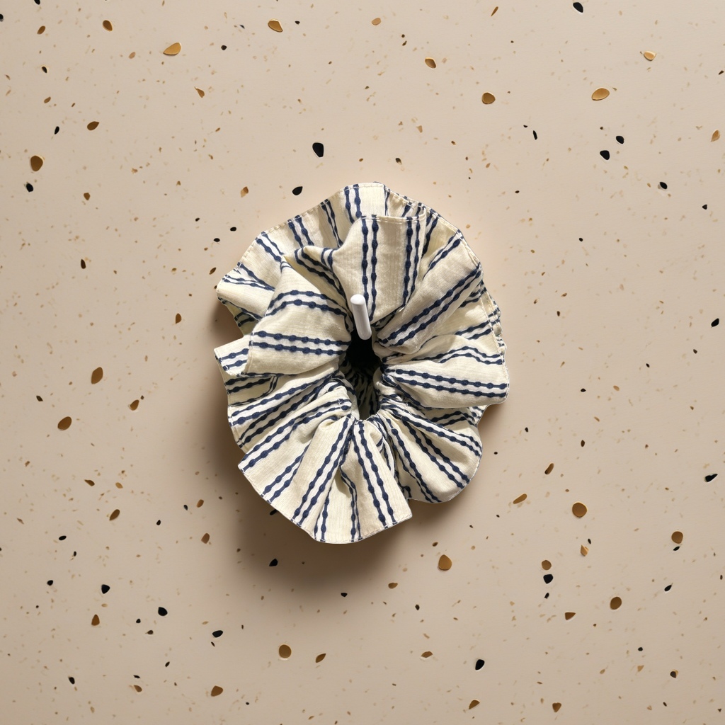 Striped fabric hair ties are fashionable, versatile, elastic and comfortable hair styling products