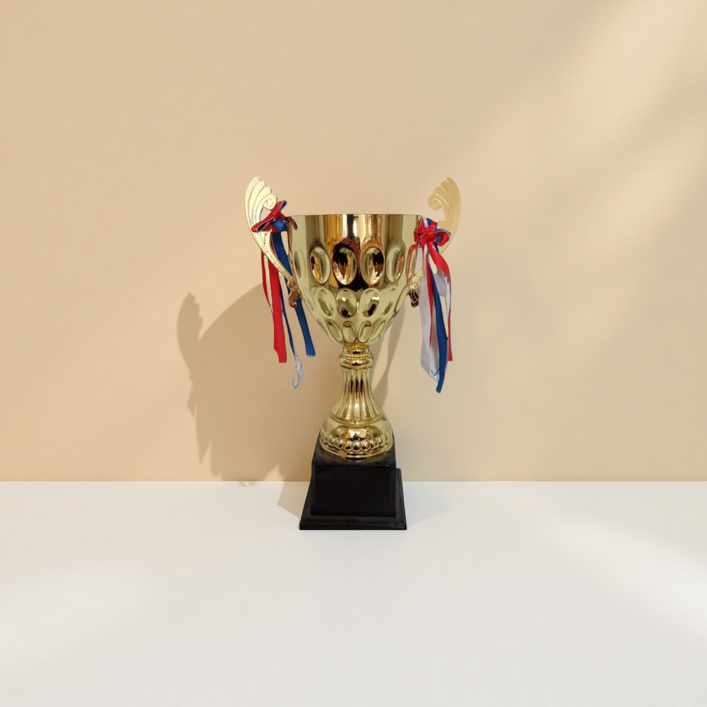 The golden trophy, custom-made for the celebration and award ceremony, features a metallic texture that is high-end and elegant details Picture