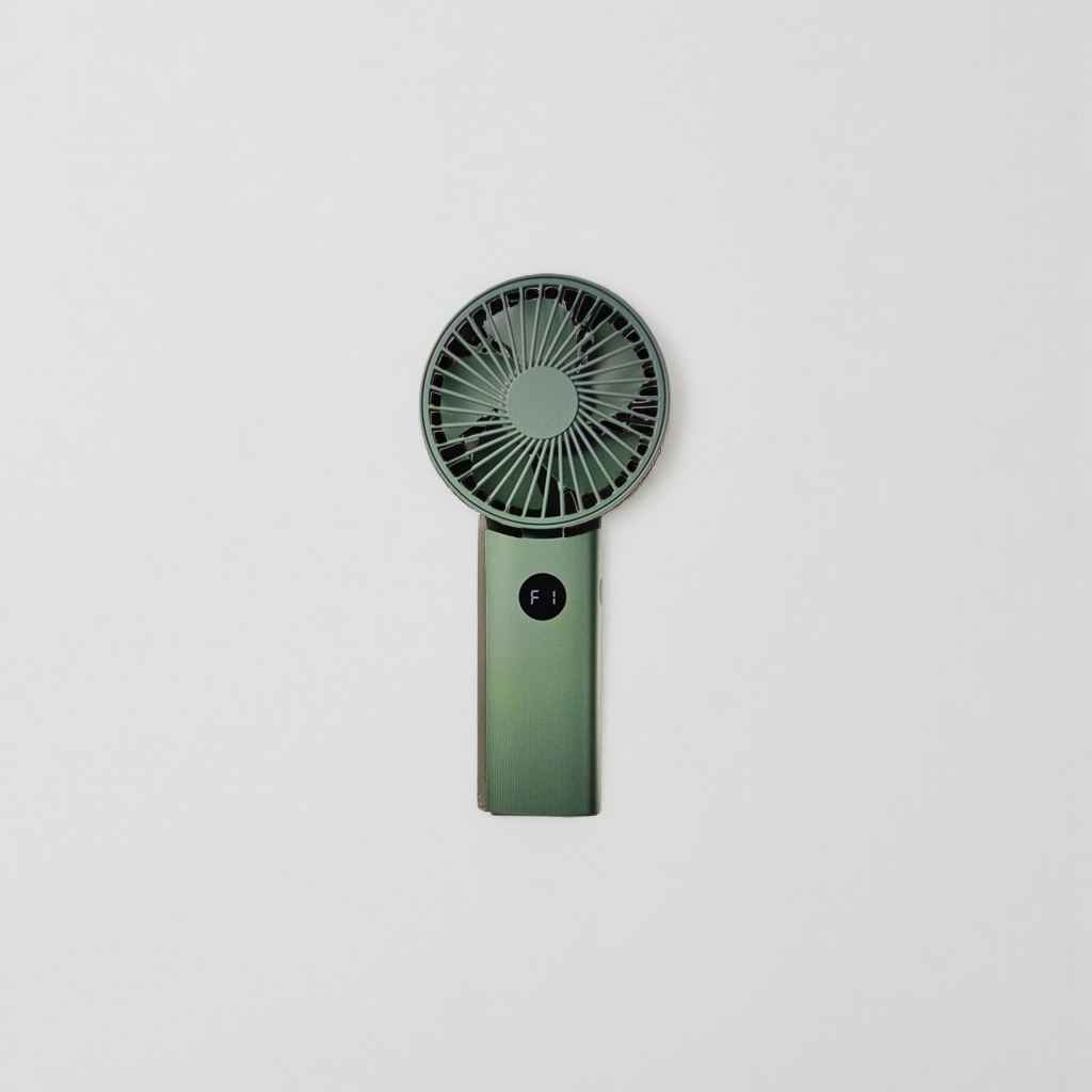 The green portable handheld fan is small, quiet, and can be charged via USB for long battery life Specification image