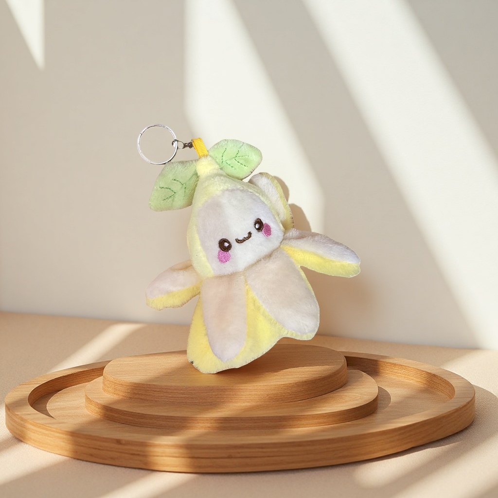 A cute and soft banana-shaped plush toy pendant for home decoration, a car keychain details Picture
