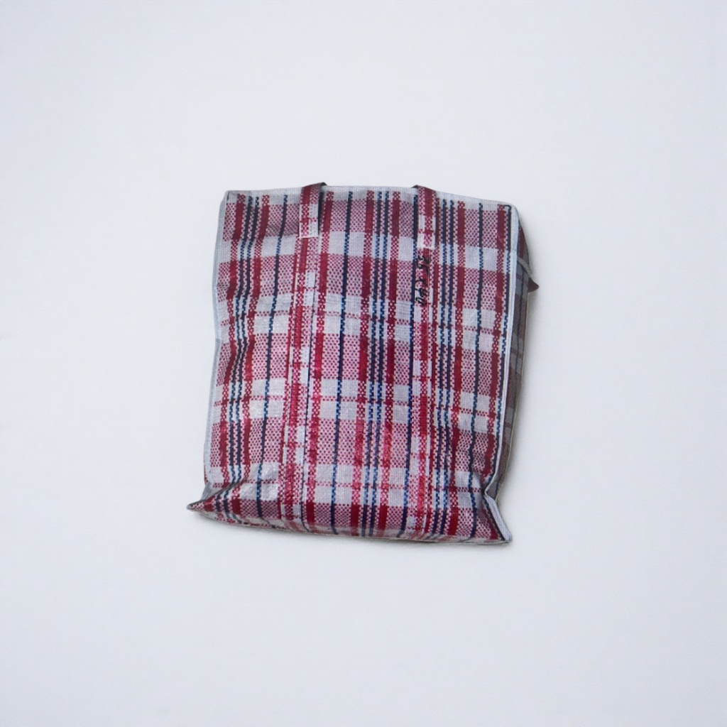 A large-capacity hand-held shopping bag with a checkered pattern made of cotton and linen fabric, and a foldable eco-friendly storage bag Application Scenario