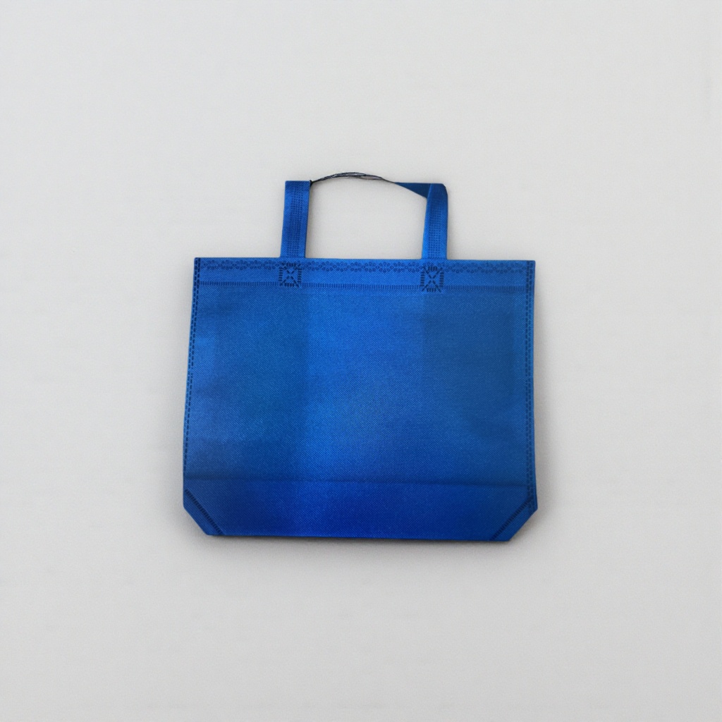 The blue non-woven fabric hand-held eco-friendly shopping bag is reusable and simple yet elegant Application Scenario