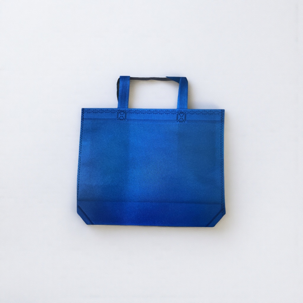The blue non-woven fabric hand-held eco-friendly shopping bag is reusable and simple yet elegant