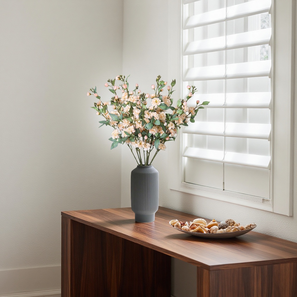 A home flower arrangement set with a simple glass vase and a bouquet Application Scenario