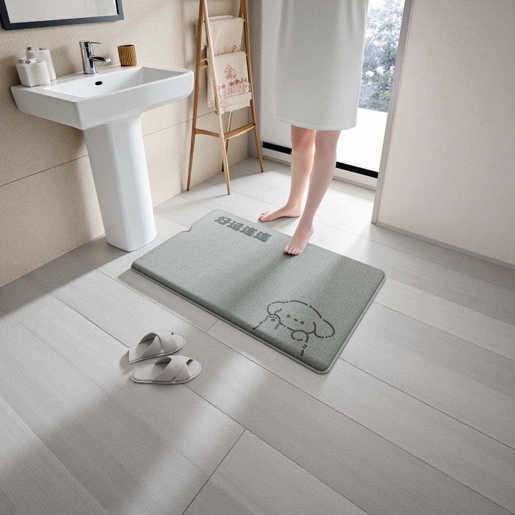 Grey memory foam cartoon bathroom floor mat with continuous good luck and white slippers details Picture