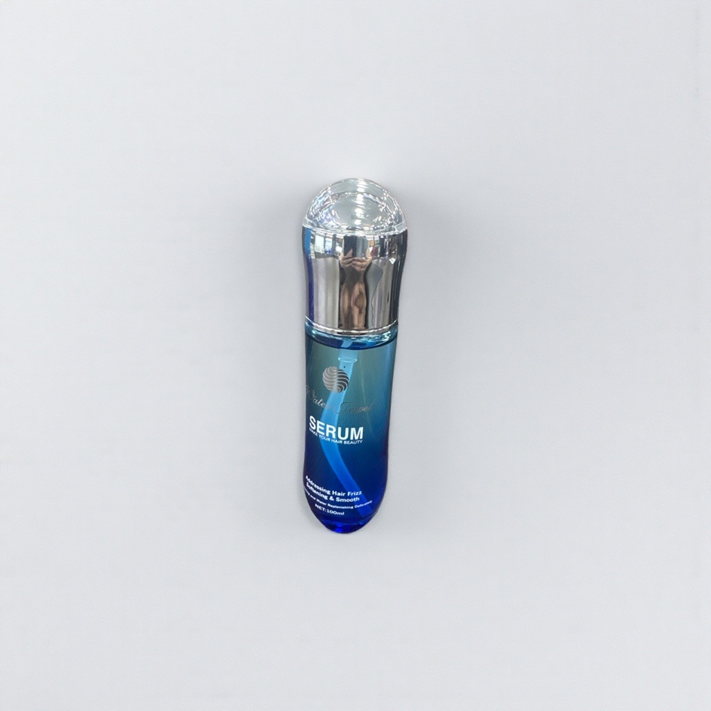 The blue transparent bottle hair care essence repairs damaged hair to make it smooth and shiny Specification image