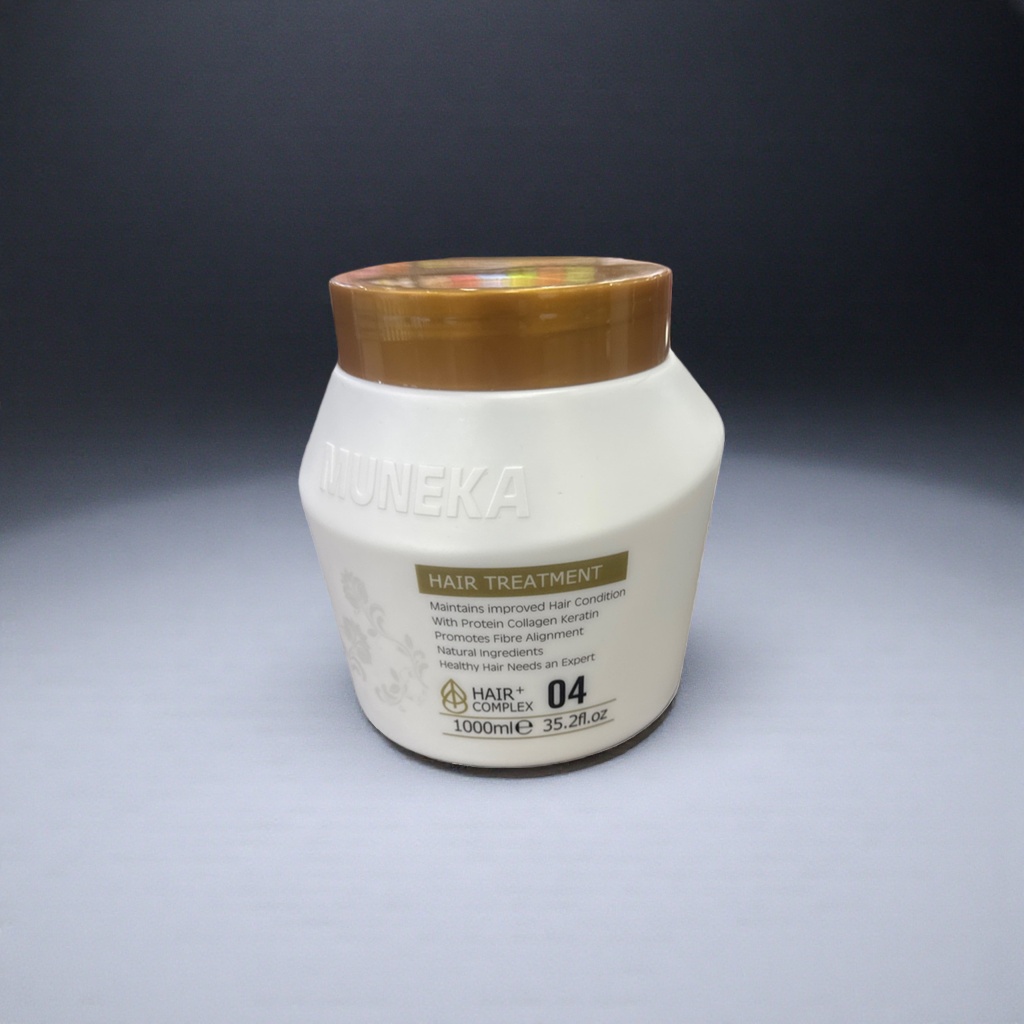 Hair care products with a white bottle and a golden cap details Picture