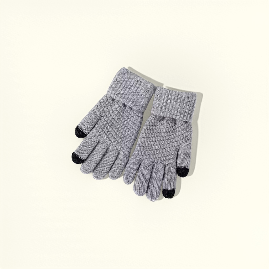 Grey knitted gloves are warm and anti-slip thin hand care products for women in autumn and winter