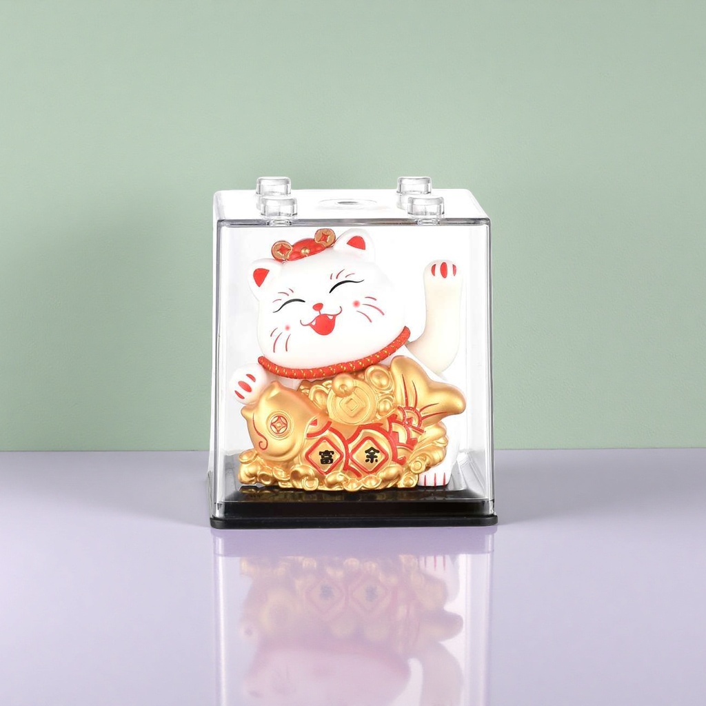 The copper sculpture of the Maneki Neko on the office desk is a feng shui mascot for attracting wealth and good fortune details Picture