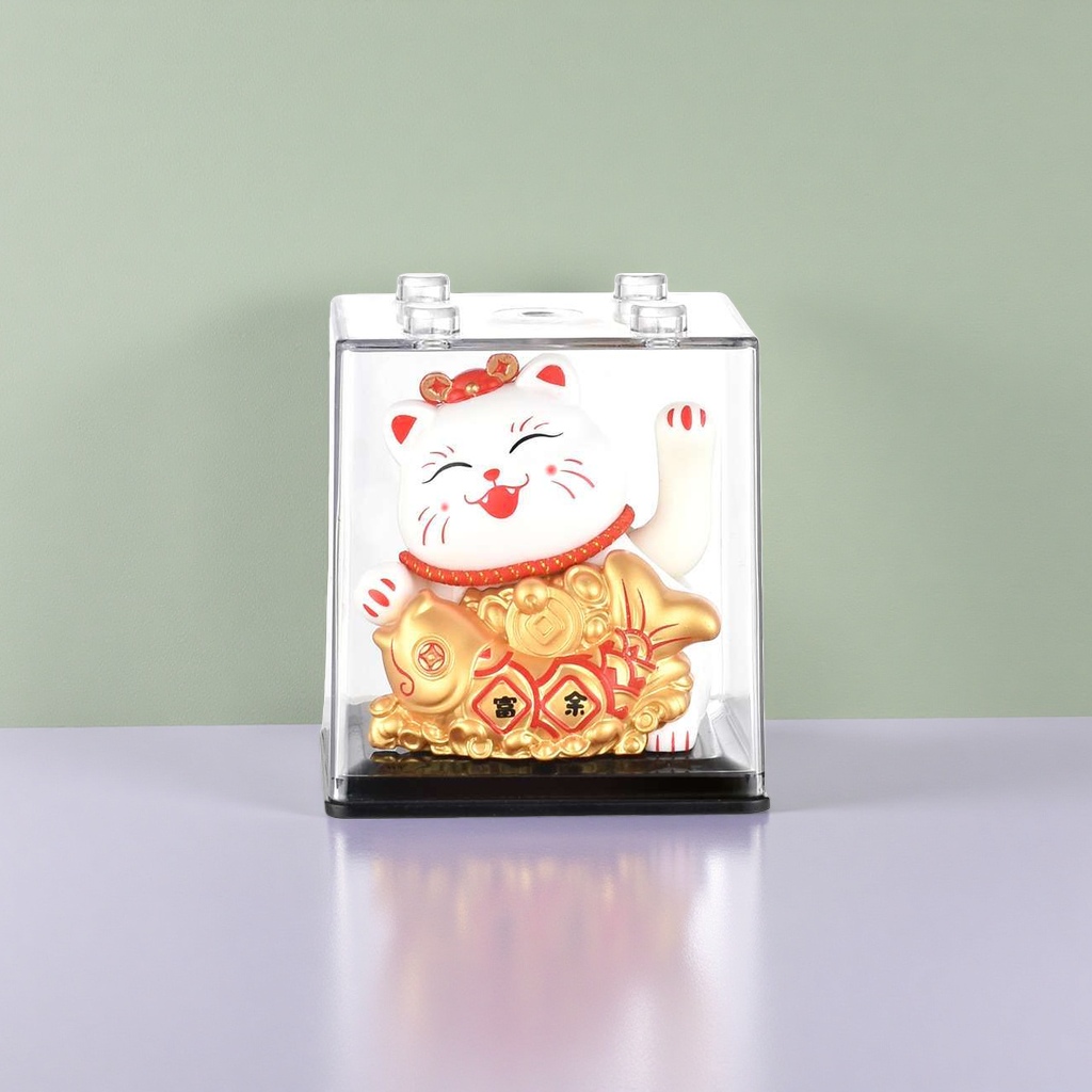 The copper sculpture of the Maneki Neko on the office desk is a feng shui mascot for attracting wealth and good fortune