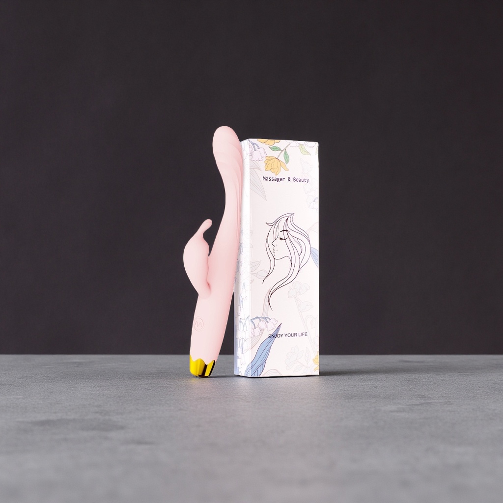 粉色硅胶按摩器肩颈腰背家用便携式振动理疗仪