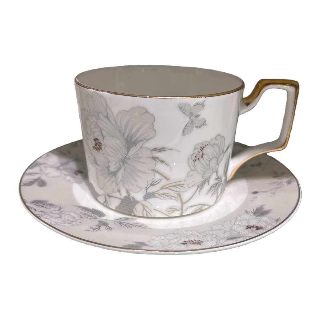 花卉图案+茶杯和茶托白底实物图