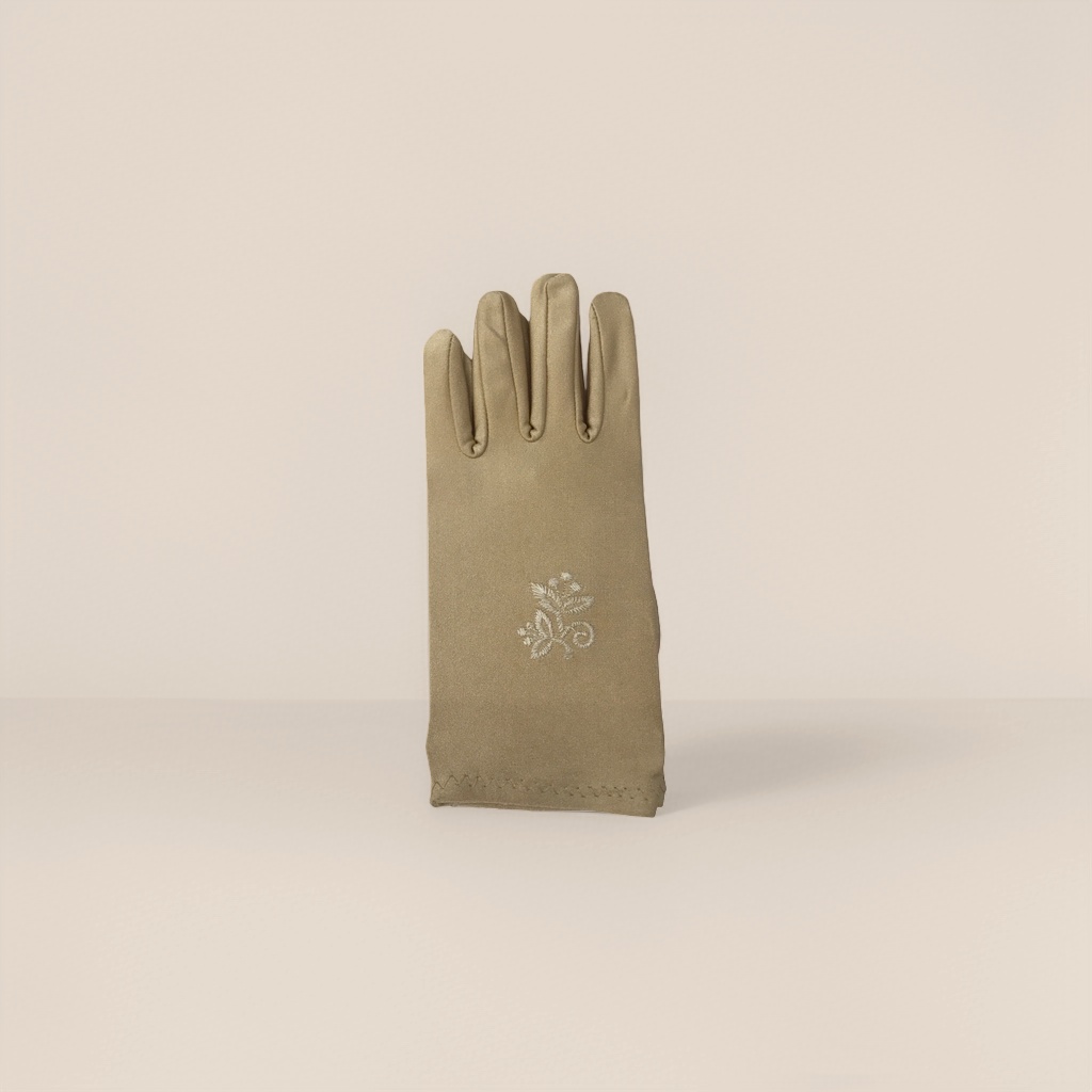 Light-colored embroidered ladies' gloves are elegant and versatile, providing warmth
