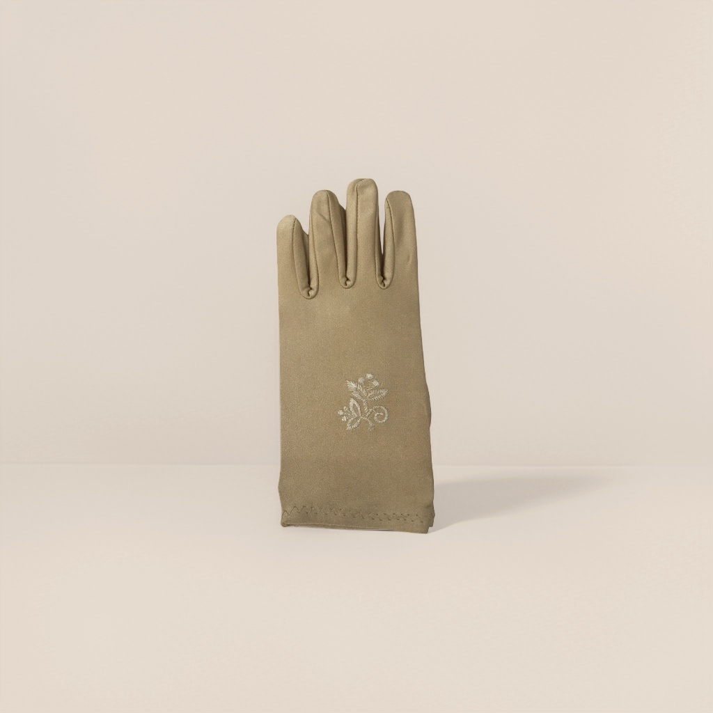 Light-colored embroidered ladies' gloves are elegant and versatile, providing warmth details Picture