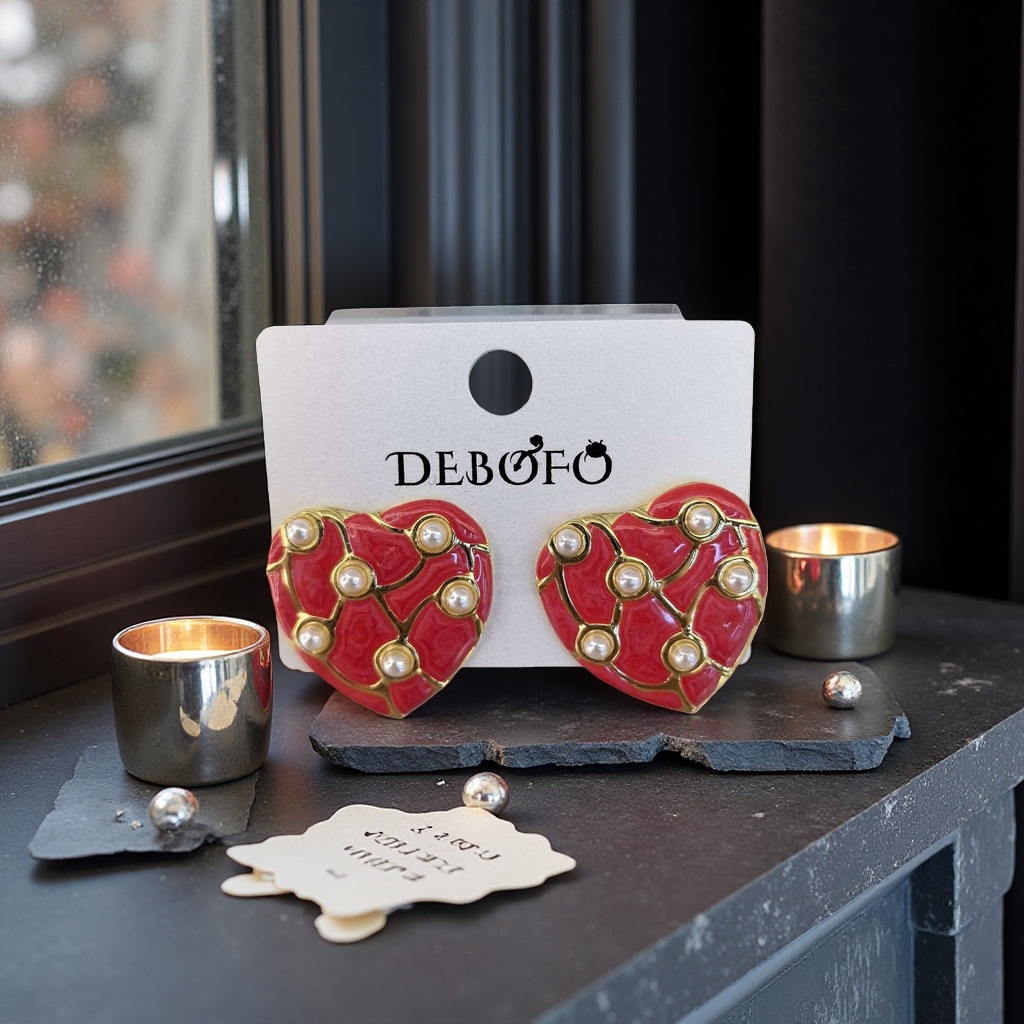 Red heart-shaped pearl stud earrings are fashionable and simple earrings that are versatile for ladies