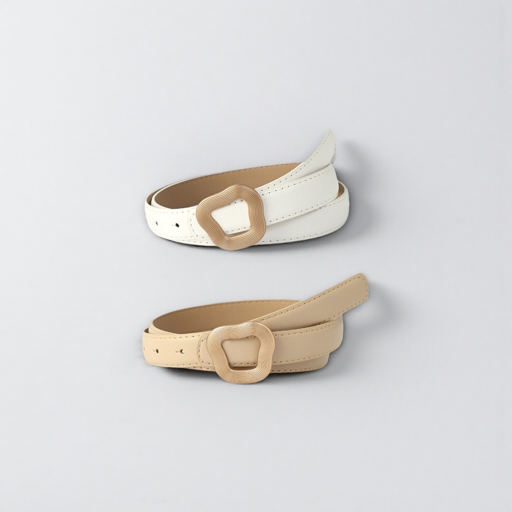 A simple and versatile leather belt for both men and women, available in white and beige