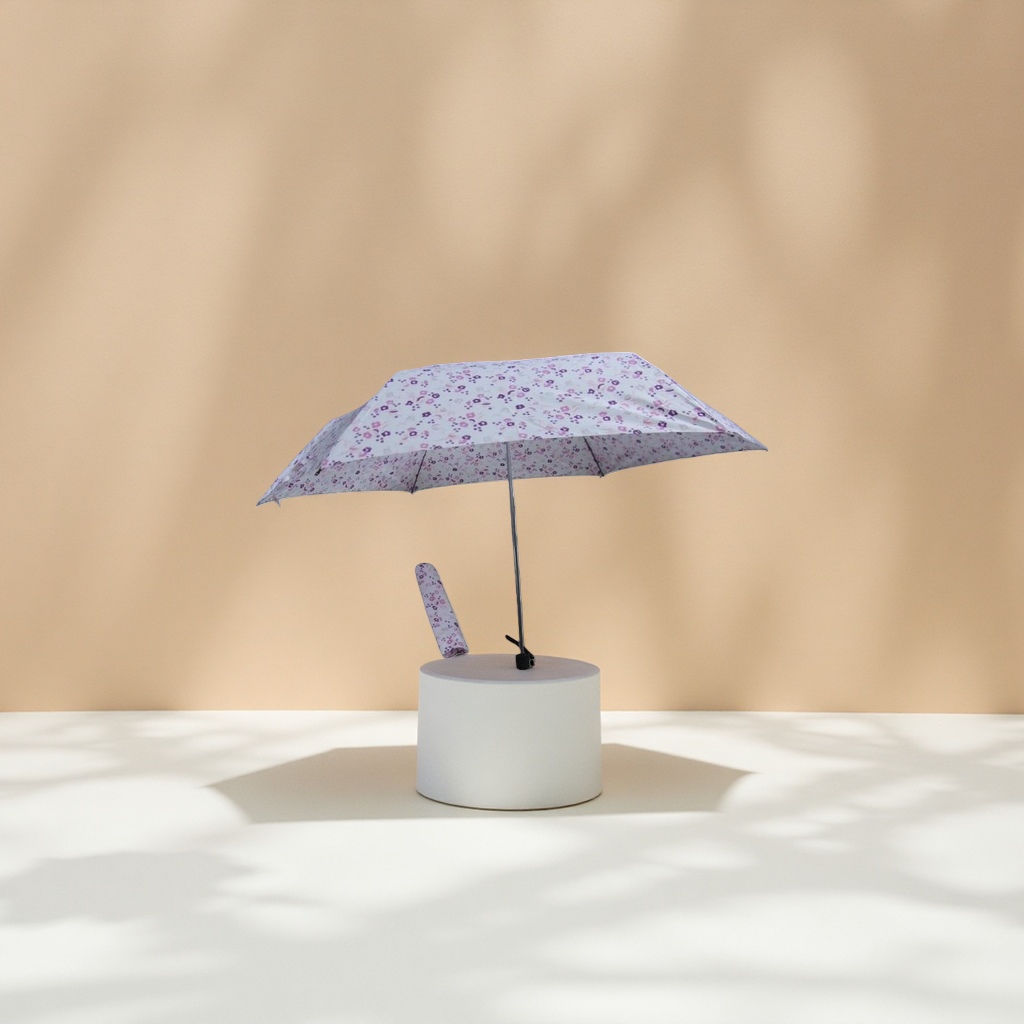 A portable, automatic opening and closing umbrella made of high-density impact-patterned fabric for women