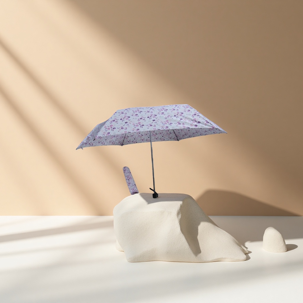 A portable, automatic opening and closing umbrella made of high-density impact-patterned fabric for women details Picture