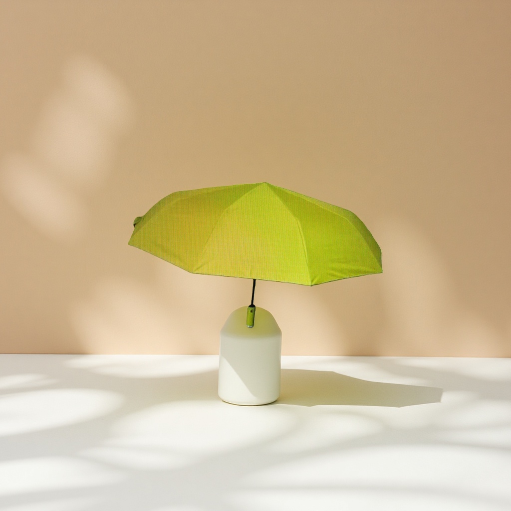 The yellow all-weather umbrella is waterproof, sun-proof, portable, foldable and has a long handle, suitable for both women and men