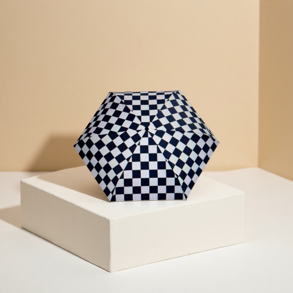 The black and white checkered pattern folding umbrella is portable and suitable for both sun protection and rain Application Scenario