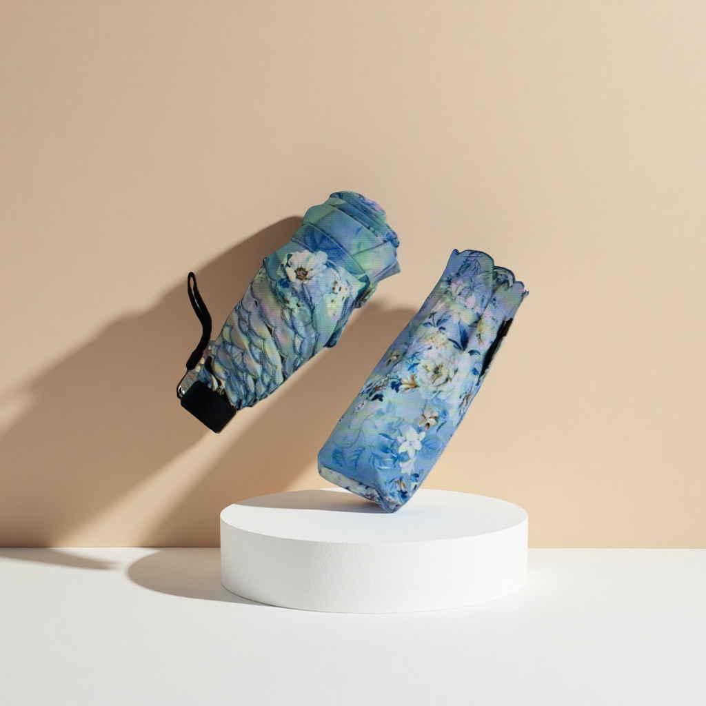 The blue floral pattern folding umbrella is waterproof, sun-proof, portable and suitable for ladies in both sunny and rainy weather details Picture