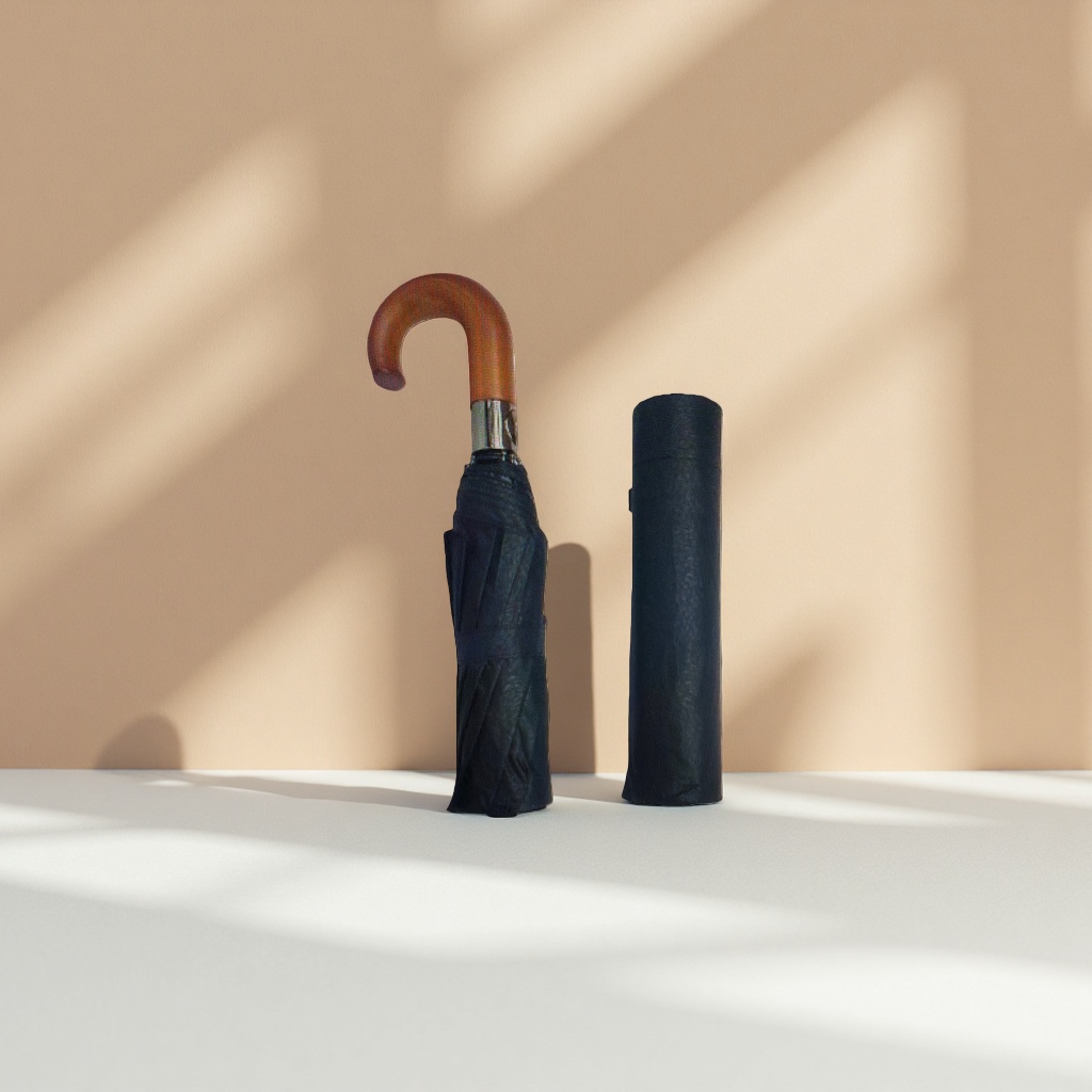 A portable folding long-handled umbrella that can be used for both weather and rain, providing protection against wind, sun and heavy rain
